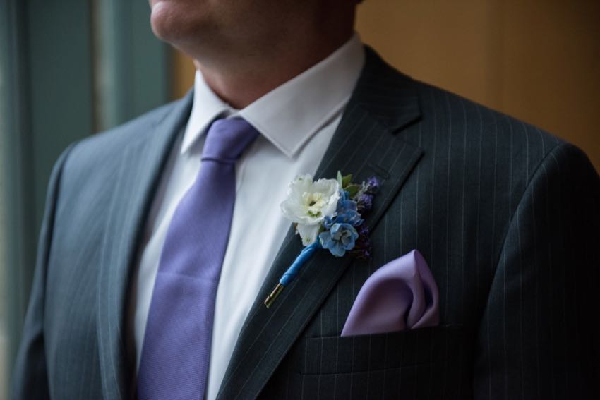 blue and purple boutonniere